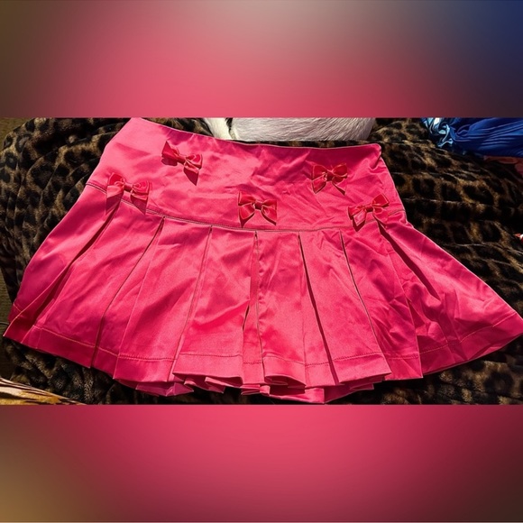 Pleated pink mini skirt - Picture 1 of 4